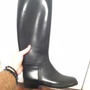 Rain boots, shaped like riding boots