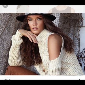 Cold shoulder wool sweater.