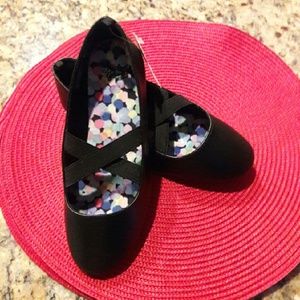 NWT.   Black criss cross casual shoes.