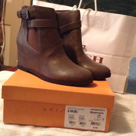 Unisa brown wedge boots.