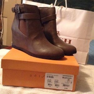 Unisa brown wedge boots.