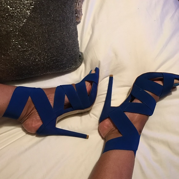Blue elastic strappy heel.