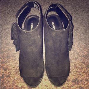Express black high heels with tassels