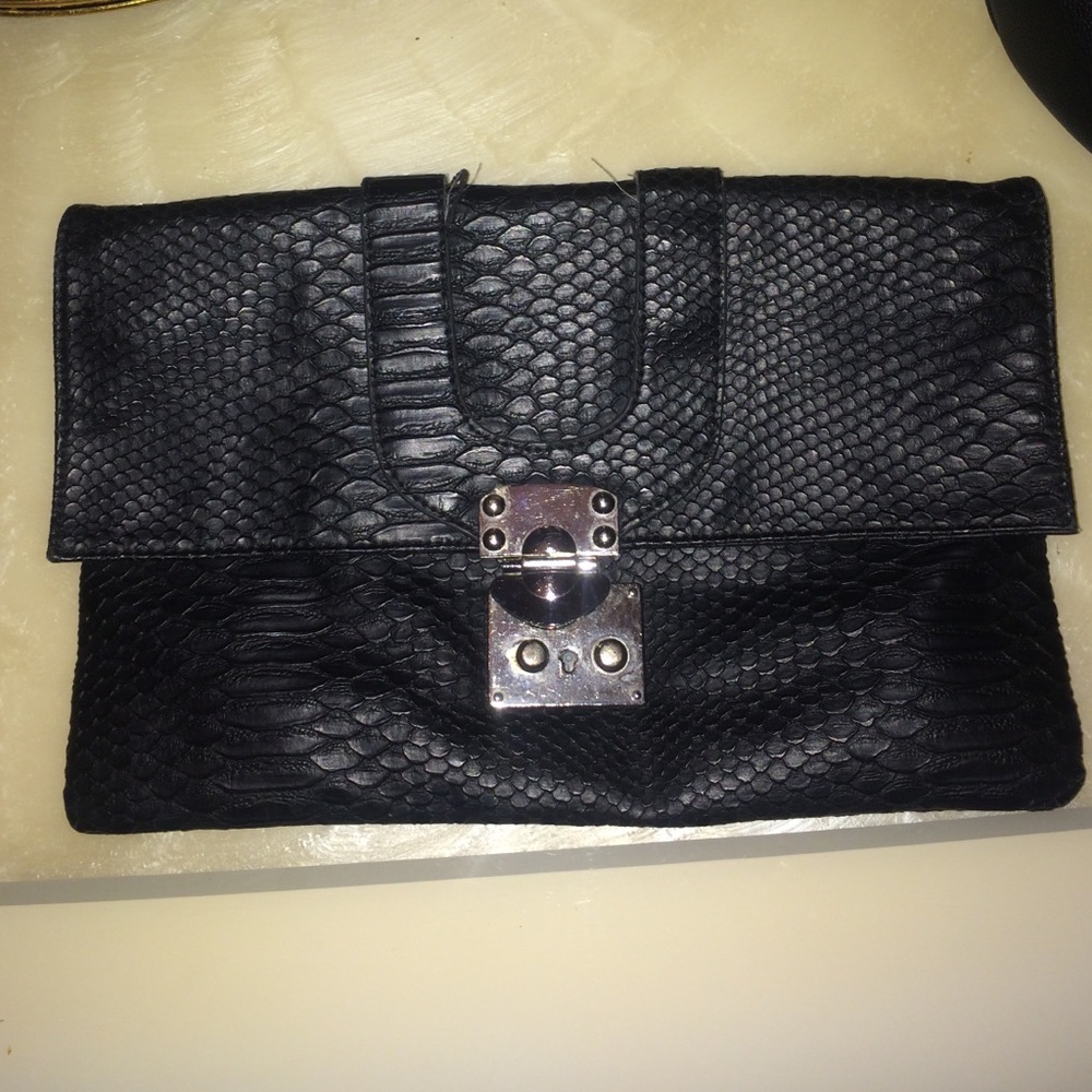 Black Leather BeBe Clutch