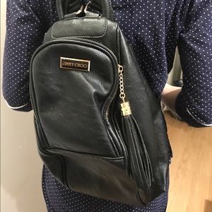 Jimmy Choo black leather back pack, never worn.