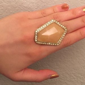 Peach stone with diamond lining ring