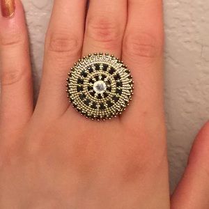 Black and gold circle medallion ring
