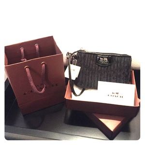 Black Coach wristlet with gift box & bag