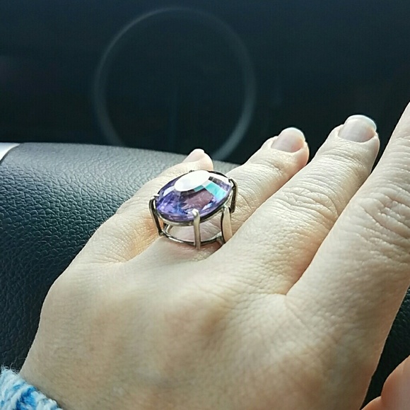 Amethyst colored gem set in sterling silver
