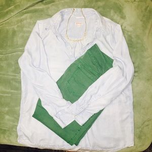 Half button down top, with collar.