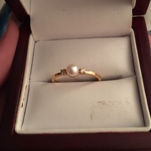 Never worn 14k gold pearl ring
