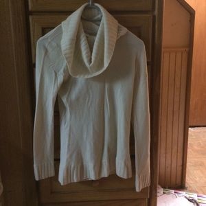 100% cashmere creme colored sweater.  Never worn.