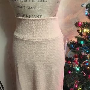 Cassie skirt size large fits 14-16 creme color