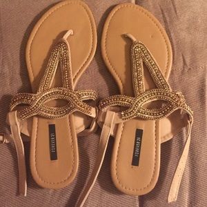 Sandals with gold embellishment