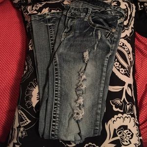 Distressed Blue Jeans