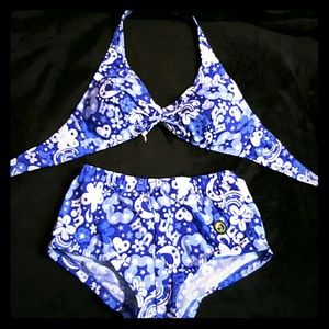 Halter swim suit with boy short bottoms.