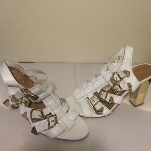 Wi rite and gold heels