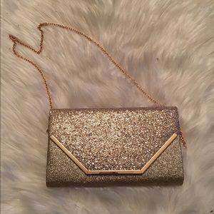 Call It Spring gold glitter clutch