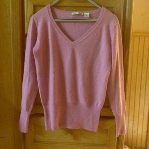 100% cashmere sweater in pink.  Never worn.