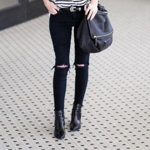 Black distressed J brand jean