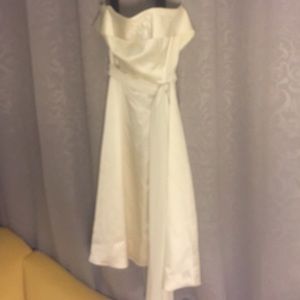 A Lined Strapless Party Dress w/ sash waist.