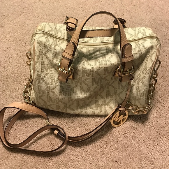 Michael Kors hand purse/cross bag
