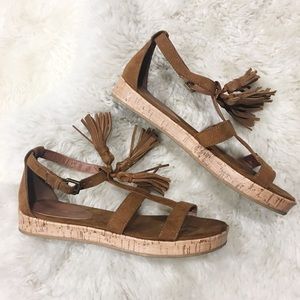 Adorable tasseled sandals!