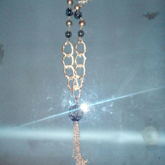Long gold necklace