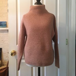 Nude pink turtleneck sweater