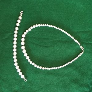 Silver necklace and bracelet set.