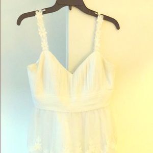 Knee length white dress with flower straps