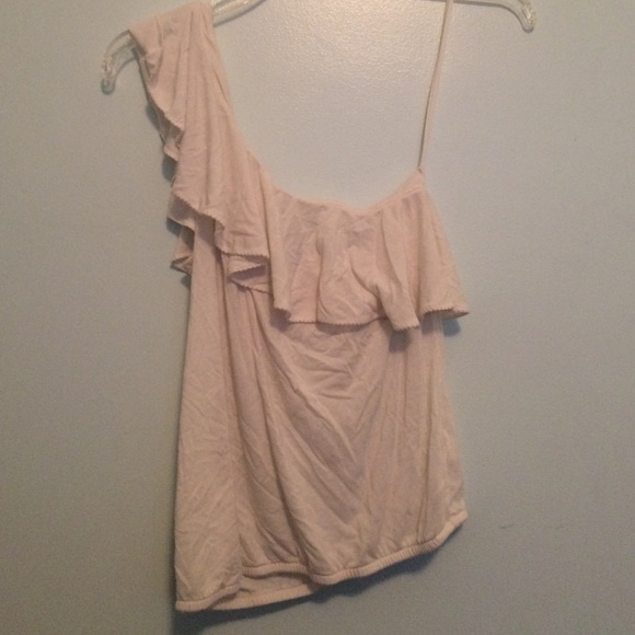 One shoulder white top