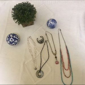 4 necklaces and one cuff bracelet