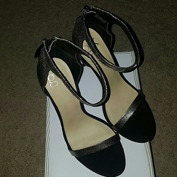 GX by Gwen Stefani black and gold heels.