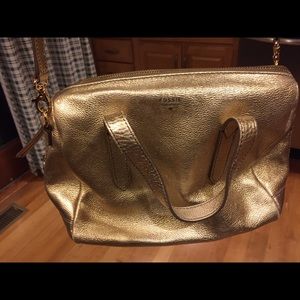 Fossil gold purse.