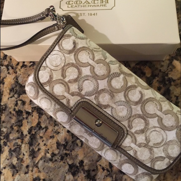 Coach silver and gold clutch