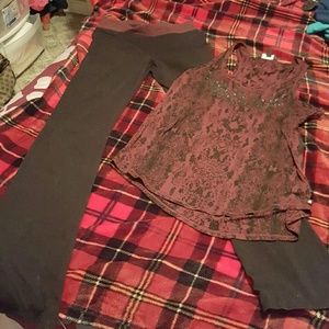 A cute pair of boot cut leggings /sheer like tank