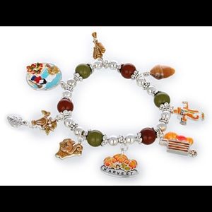 Falling leaves, charms and scene charm bracelet.