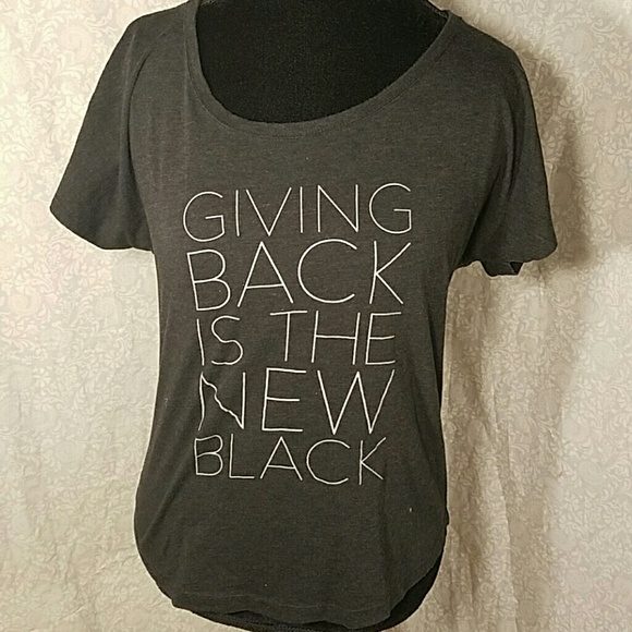 Half United Tee. Giving Back Is The New Black
