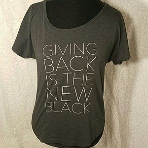 Half United Tee. Giving Back Is The New Black