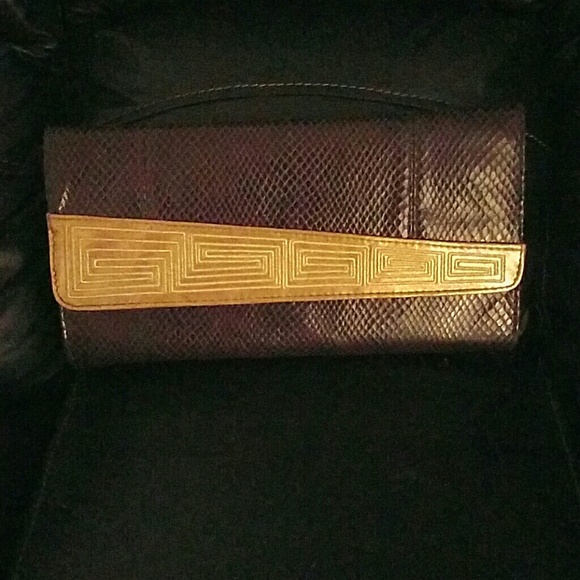 Brown clutch gold design