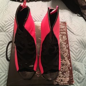Neon pink laced peep toe booties