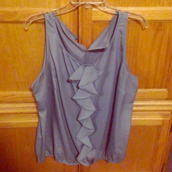 Dressy blouse with elastic bottom.Good condition!