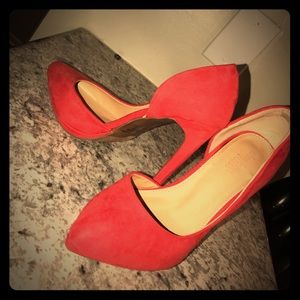 Red suede pumps