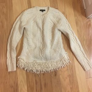 Soft cream-colored sweater