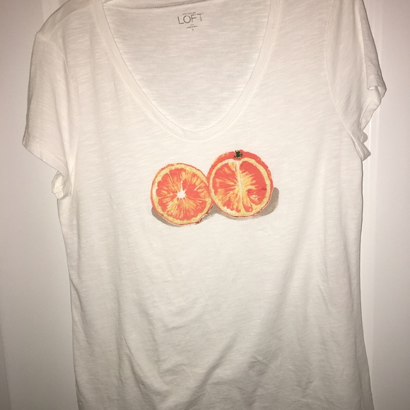White top with oranges