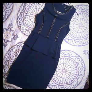 Navy peplum dress with faux leather detail