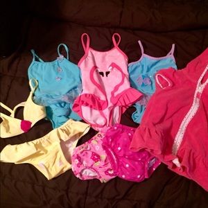 Swimsuits, 2 large swim diapers and a coverup!