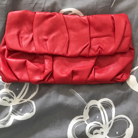 Red clutch wrinkled