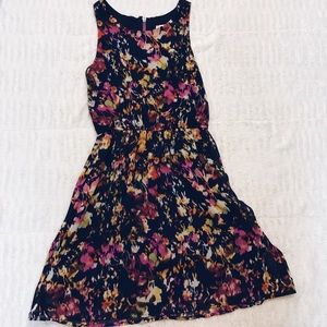 Floral dress with exposed zipper detail on back
